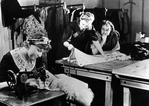 Mandatory: Forced laborers in a clothing store, 1943