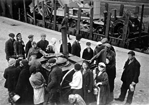 Reported: Forced workers get tea from a field kitchen, 1942