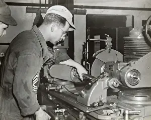 Erding: A Foreman and an Airman Check a Grinding Machine at the ?
