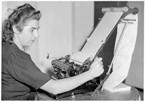 Typing: A form feeding machine on a typewriter