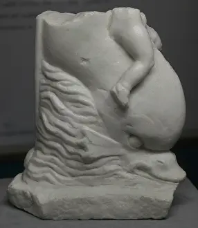 Dauphin: Fragment of a statuette depicting Eros riding