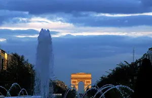 Triomphe: France. Paris. Night view of the Champs Elysees
