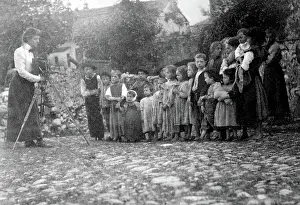 Tripod: Frances Benjamin Johnston Photographing Children, 1900