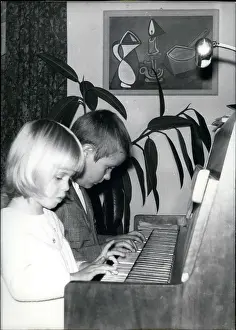 Talents: Frank-Albert and sister Mara playing the piano
