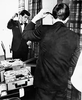Combing: Frank Sinatra Jr prepares for show in London