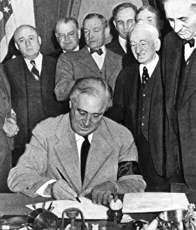 Delano: Franklin Delano Roosevelt signs the declaration of war again