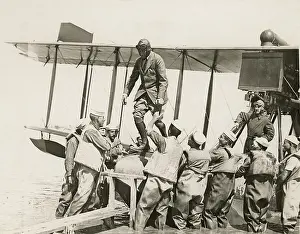 Asst: Franklin Roosevelt, Asst. Navy Sec. leaves a seaplane
