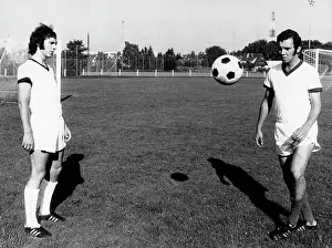 Beckenbauer: Franz Beckenbauer practicing soccer with a teammate