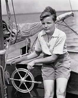 Zipper: Freckle-Faced Boy Sitting at Steering Wheel of