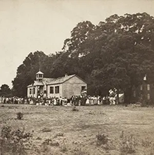 Freedmen: Freedmen and their children in front of Miss