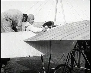 Pegoud: French Aviator Adolphe Pegoud Being Strapped