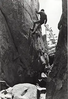 Sheer: French boy scout rock climbing
