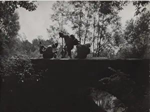 Directions: French boy scouts on a bridge over a river
