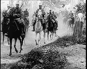 Galloping: French Cavalry Galloping Along A Dusty Road