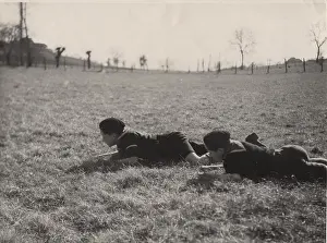 Crawling: French cub scouts in a field