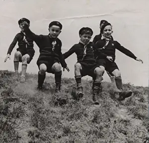 Sliding: French cub scouts sliding down a slope