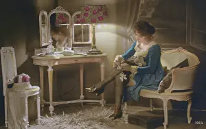 Garters: French lady getting ready to go out in her boudoir