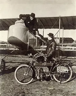 Despatch: A French Moto cyclist despatch rider hands over a despatch