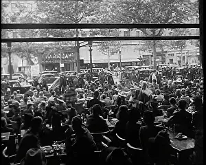 Crowding: French People Crowding Around A Cafe In Paris