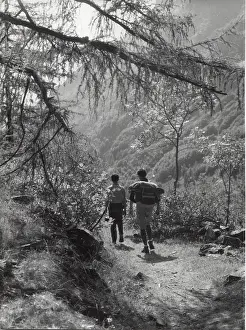 Backpack: Two French scouts on a mountain path