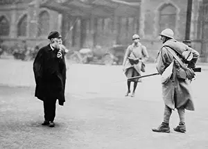3 People: French soldier posted in front of the main Essen