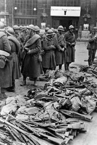 Capitulate: French troops capitulate, 1940