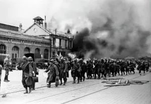 Capitulate: French troops capitulate, 1940