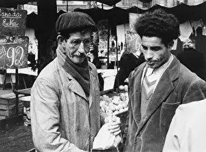 Corduroy: Two Frenchmen outside a shop