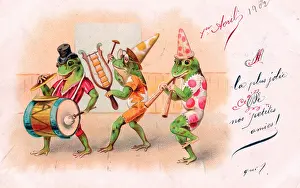 Cymbal: Three frogs playing music on an April Fool postcard
