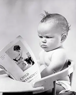 Disapproving: Frowning Flummoxed Disapproving Grumpy Baby Boy