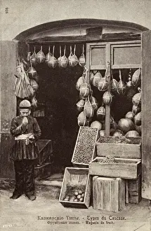 Greengrocer: Fruit Shop selling Melons, dates and apples - Georgia