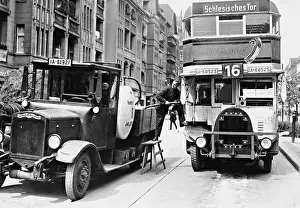 Saved: Fueling a double decker bus in Berlin, 1932