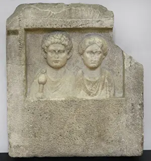 Spouses: Funerary stele bearing busts of a man with a sword