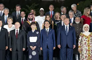 Multinational: G20 leaders and some of their spouses pose
