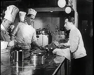 Waiters: A Galley With Kitchen Staff Cooking and Waiters