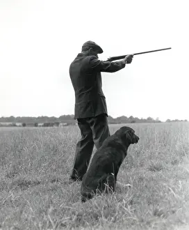 Gamekeeper: Gamekeeper with dog and gun