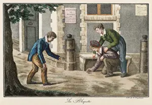 Marbles: Games: three boys playing marbles
