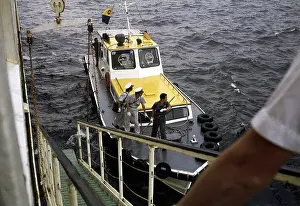 Gangways: A gangway leading to a small boat