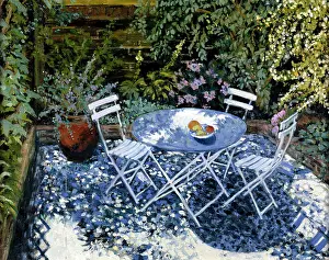 Boshoff: A Garden in Fulham ? with white garden table and chairs