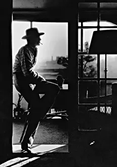 Caravans: Gary Cooper in his apartment in Hollywood, 1936