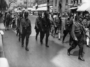 Neuhauser: Gasschutzstaffel of the SA marching through Munich, 1933