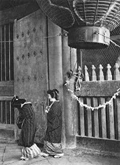 Kannon: Two Geishas walk outside a temple