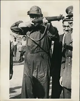 Floppy: Gen Mohammed Neguib, PM of Egypt, rifle training