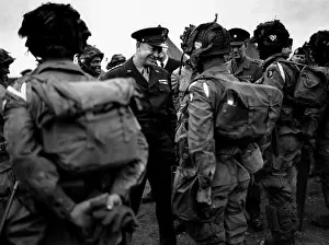 101st: General Eisenhower talks with paratroopers of