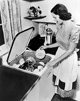 Dishwasher: General Electric 1948 top loading dishwasher. ?