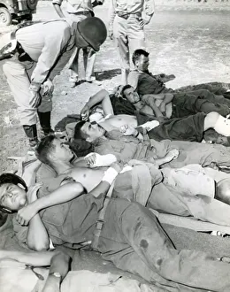 Litters: General George Patton talking to casualties in