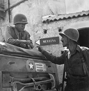 Colonels: General George Patton talking with Col. Lyle Bernard