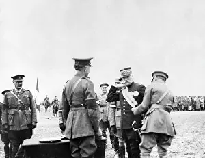 Decorates: General Mahon decorates Sarrail with the KCMG