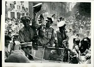 Neguib: General Neguib, PM of Egypt, waves to crowd, Lower Egypt