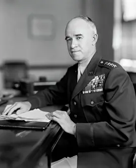 Paperwork: General Omar Bradley sitting at a desk, dated 1945